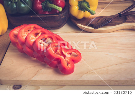 sweet peppers on wooden table background sweet peppers on wooden table background 53180710