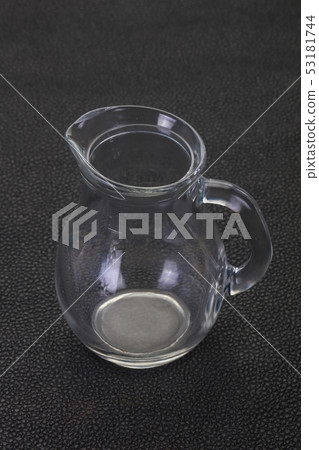Empty glass jug 53181744