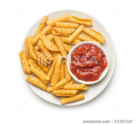 Rolled mexican nacho chips and salsa dip. Rolled mexican nacho chips and salsa dip. 53187187