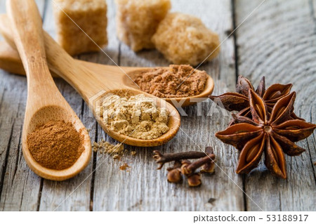 Selection of christmas spices on rustic wood background 53188917