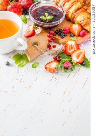 Breakfast - croissants with berries Breakfast - croissants with berries 53189387