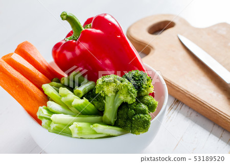 Preparing vegetable sticks Preparing vegetable sticks 53189520