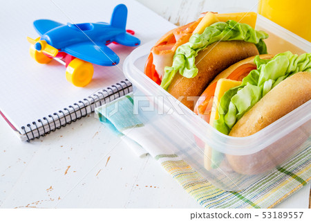 Lunch box with sandwich salad and friuts Lunch box with sandwich salad and friuts 53189557