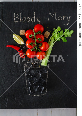 Bloody Mary ingredients on dark stone background 53190047