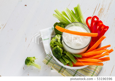 Vegetable sticks and yogurt dip Vegetable sticks and yogurt dip 53190396