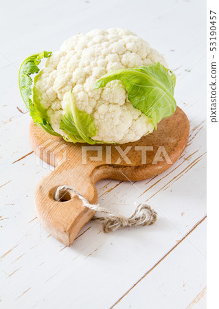 Califlower on white wood background Califlower on white wood background 53190457