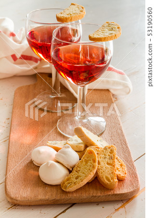 Traditional italian cookies served with wine Traditional italian cookies served with wine 53190560