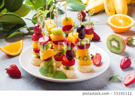 Fresh fruit on skewers. Concept buffet for a summe 53192112