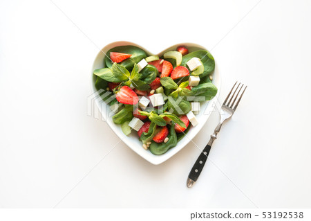 Fresh salad of strawberry, celery, spinach, pine. Fresh salad of strawberry, celery, spinach, pine. 53192538
