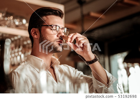Close up of brunette man that working in bar Close up of brunette man that working in bar 53192698