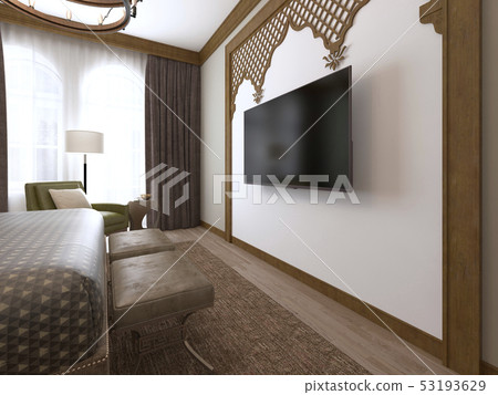 A TV on the wall and a TV stand, wooden carvings A TV on the wall and a TV stand, wooden carvings 53193629