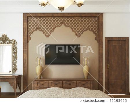 A TV set on the wall and a TV stand with wooden 53193633