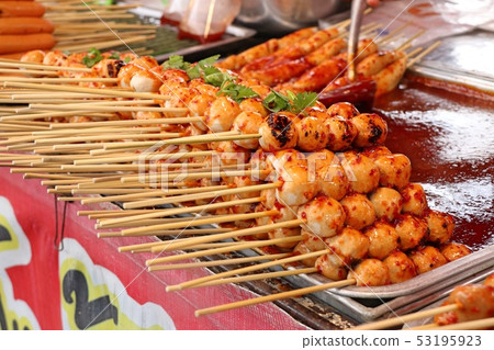 grilled meatballs and sausage at street food 53195923