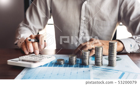 Businessman accountant Calculating on data Businessman accountant Calculating on data 53200079