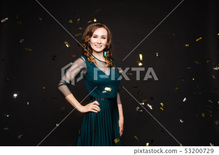 Happy young girl looking surprisingly while golden 53200729