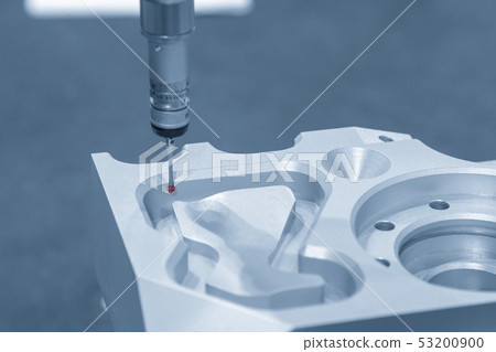 The CMM probe measuring the sample parts. 53200900
