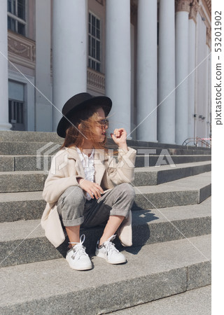little girl portrait on the street 53201902