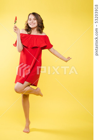 Seductive woman like sweet doll with candy. Seductive woman like sweet doll with candy. 53203918