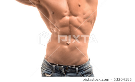 Male torso with perfect abs. Man in blue jeans isolated on white. Male torso with perfect abs. Man in blue jeans isolated on white. 53204195