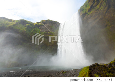 Skogafoss falls in summer season view, Iceland Skogafoss falls in summer season view, Iceland 53204831