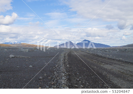Dirt road along central highlands of Iceland. 53204847