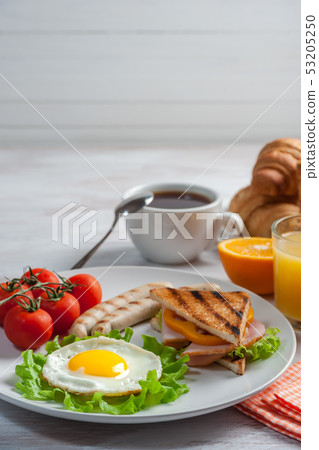 Fried eggs with sausages plate 53205250