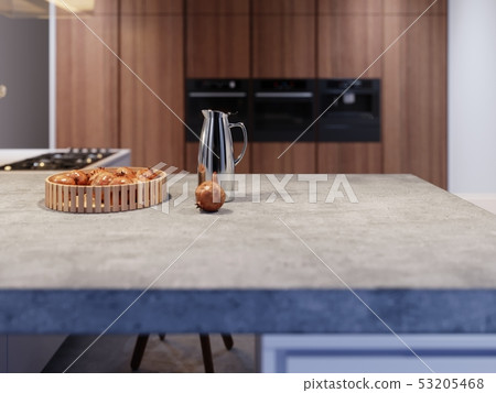 Fruits on the concrete worktop of a modern 53205468