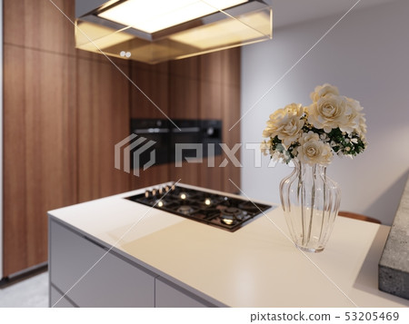 Vase of flowers on the kitchen countertop in the Vase of flowers on the kitchen countertop in the 53205469