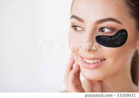 Skin Care Mask. Woman With Black Patches 53209071