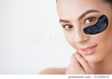 Skin Care Mask. Woman With Black Patches 53209072