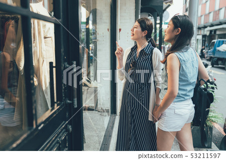 shopping time with friends young local women shopping time with friends young local women 53211597