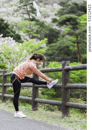 Young woman park exercise 53212425