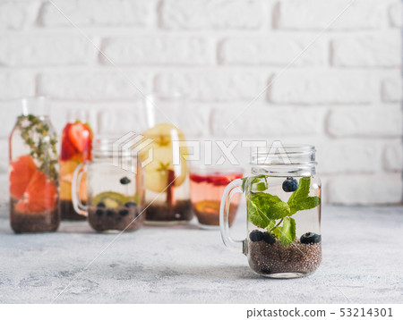 mint and blueberry chia water in mason jar mint and blueberry chia water in mason jar 53214301