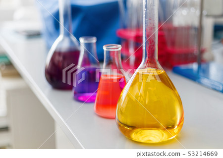 Chemical laboratory flask with blue purple-pink 53214669