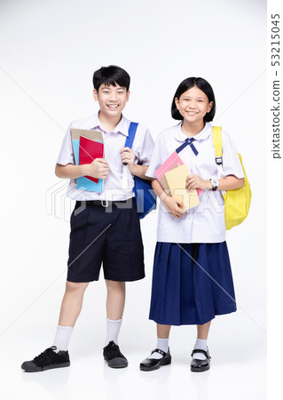 Two asian smiling school kids with colorful Two asian smiling school kids with colorful 53215045