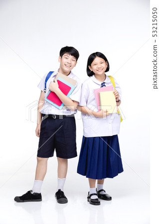 Two asian smiling school kids with colorful Two asian smiling school kids with colorful 53215050