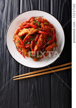 Schezwan chicken or szechuan chicken is a popular Schezwan chicken or szechuan chicken is a popular 53217182