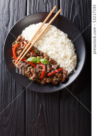 Delicious basil beef with bell peppers, garlic and Delicious basil beef with bell peppers, garlic and 53217195