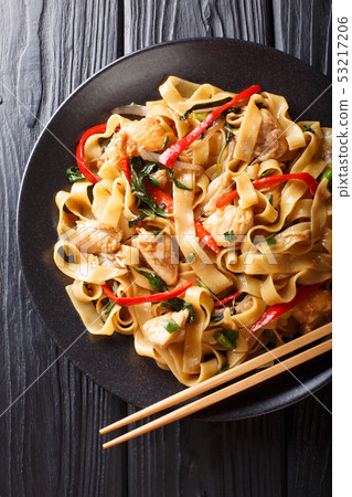 Drunken noodles pad kee mao with chicken, basil, Drunken noodles pad kee mao with chicken, basil, 53217206