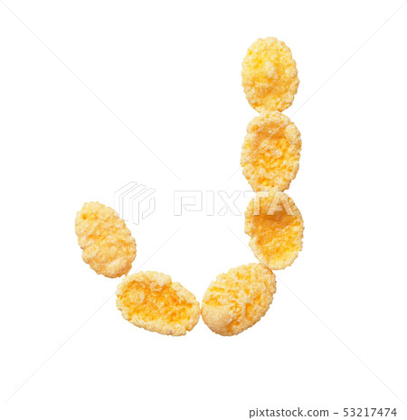 Yellow cornflakes letter J isolated on white background. Alphabet cereal flakes. Yellow cornflakes letter J isolated on white background. Alphabet cereal flakes. 53217474