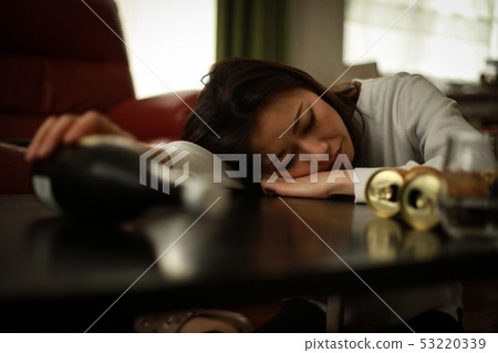 Sick drunk sleepy woman 53220339