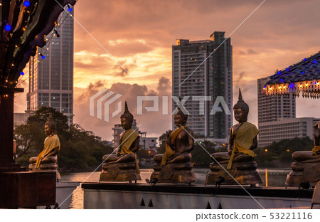 Buddha statues on the Beira Lake in Colombo. Buddha statues on the Beira Lake in Colombo. 53221116