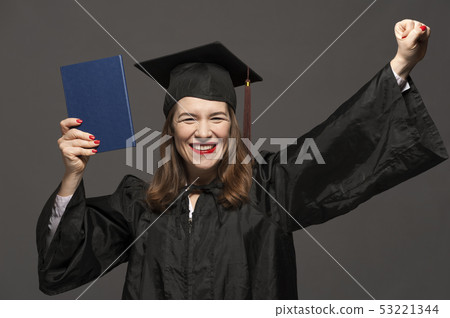 Graduate female student with stubble in eyeglasses wearing black mantle Graduate female student with stubble in eyeglasses wearing black mantle 53221344