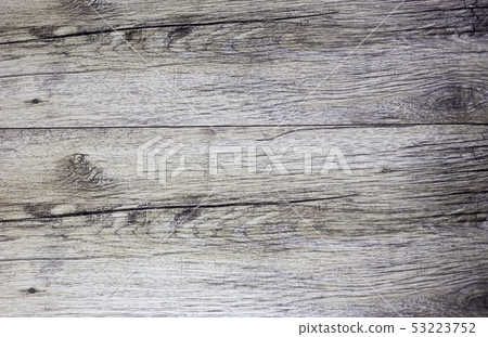 Dark brown scratched wooden cutting board. Wood 53223752