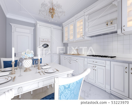 White kitchen with dining table in a classic 53223970