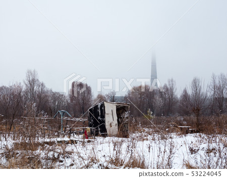 Temporary self-made shelter in winter Temporary self-made shelter in winter 53224045