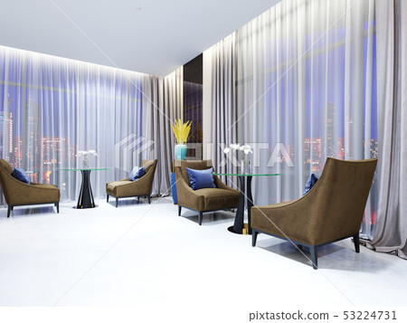 A table with two easy chairs in the lounge area of A table with two easy chairs in the lounge area of 53224731