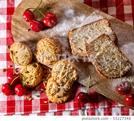 Oatmeal cookies snack and cherry breakfast close up 53227348