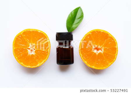 Essential oil with fresh orange citrus fruit on Essential oil with fresh orange citrus fruit on 53227491