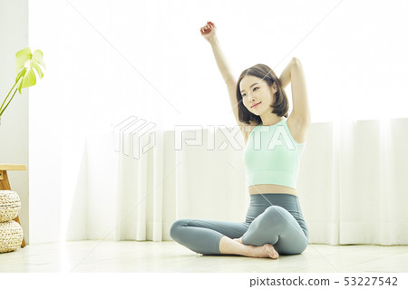 Stretching, exercise, fitness, young woman 53227542